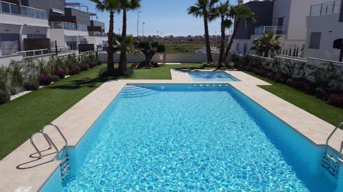 Úszómedence, Marinamed Residential Villa Sea View in Punta Prima Úszómedence, Marinamed Residential Villa Sea View in Punta Prima