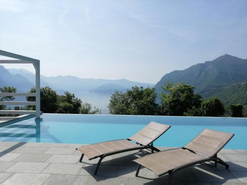 Swimming pool, IseoLakeRental - Trivia Resort in Solto Collina Swimming pool, IseoLakeRental - Trivia Resort in Solto Collina