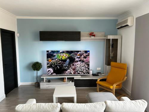 Shared lounge/TV area, Casa La Paz en Malaga, junto al Parque Tecnologico in Maqueda Shared lounge/TV area, Casa La Paz en Malaga, junto al Parque Tecnologico in Maqueda