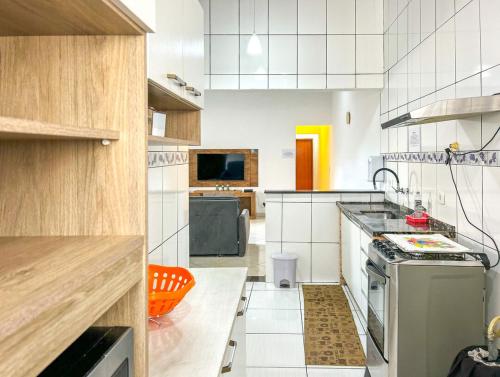 Cocina, Otima casa com WiFi e churrasqueira em Bertioga SP in San Sebastián (Sao Paulo) Cocina, Otima casa com WiFi e churrasqueira em Bertioga SP in San Sebastián (Sao Paulo)
