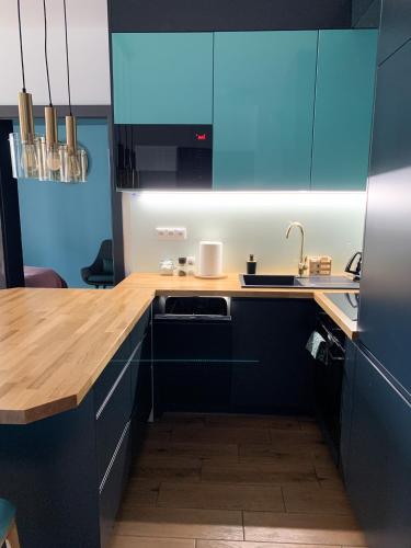 Konyha, Belzacka City Apartment in Piotrkow Trybunalski Konyha, Belzacka City Apartment in Piotrkow Trybunalski