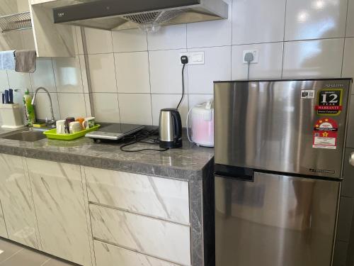 Kitchen, Sandakan Homestay Coastal Serenity 山海绿栖 near Bao Gong Temple Kitchen, Sandakan Homestay Coastal Serenity 山海绿栖 near Bao Gong Temple