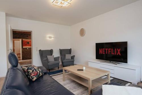 共用Lounge/電視區, bonquartier Stilvoll aufm Land leben, Top-Anbind in 亨內夫/西格 共用Lounge/電視區, bonquartier Stilvoll aufm Land leben, Top-Anbind in 亨內夫/西格