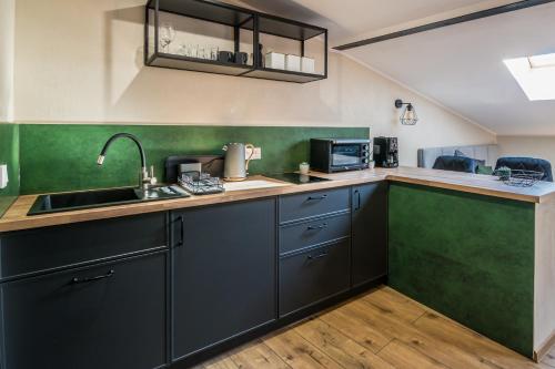 Cozinha, Apartamenty Fabrykanta Księży Młyn (Apartamenty Fabrykanta Ksiezy Mlyn) in Widzew Cozinha, Apartamenty Fabrykanta Księży Młyn (Apartamenty Fabrykanta Ksiezy Mlyn) in Widzew