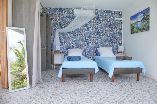 L Orchidée Bleue, bas de villa, vue mer, piscine privée (L Orchidee Bleue, bas de villa, vue mer, piscine privee) in Sainte Anne L Orchidée Bleue, bas de villa, vue mer, piscine privée (L Orchidee Bleue, bas de villa, vue mer, piscine privee) in Sainte Anne