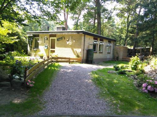 Exterior view, Holiday Home by the forest in Ommen with Pool in Ommen Exterior view, Holiday Home by the forest in Ommen with Pool in Ommen