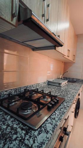 Kitchen, Appartement AL-RIMAL POUR LES FAMILLES in Martil Kitchen, Appartement AL-RIMAL POUR LES FAMILLES in Martil