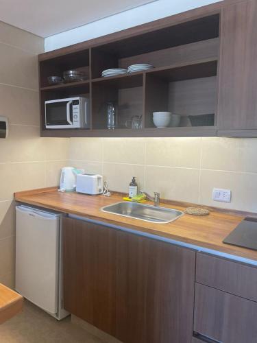 주방, Villa Maihue departamentos de montaña - Caviahue (Villa Maihue departamentos de montana - Caviahue) in 카비아우 주방, Villa Maihue departamentos de montaña - Caviahue (Villa Maihue departamentos de montana - Caviahue) in 카비아우