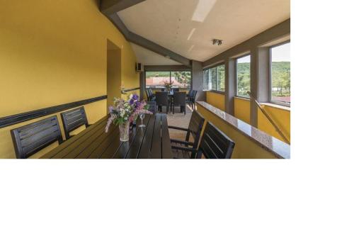 Közös társalgó / TV, Villa Una Apartments in Bartici Közös társalgó / TV, Villa Una Apartments in Bartici