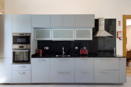 ห้องครัว, Villa Casa do Outeiro in กุยยาเบรว ห้องครัว, Villa Casa do Outeiro in กุยยาเบรว