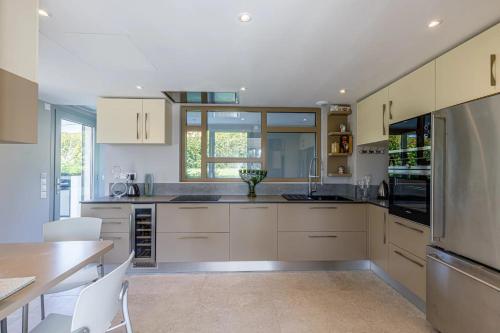 Kitchen, Luxueuse Villa Charleston - Vue mer, Sauna Hammam in Trois Moulins Kitchen, Luxueuse Villa Charleston - Vue mer, Sauna Hammam in Trois Moulins