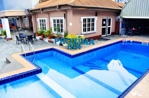 Басейн, PROXIMA INN in порт Харкорт Басейн, PROXIMA INN in порт Харкорт