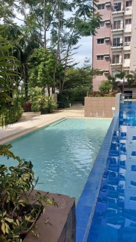 Schwimmbad, Relaxing 2bedrooms Matina Enclaves condo in Tigatto Schwimmbad, Relaxing 2bedrooms Matina Enclaves condo in Tigatto