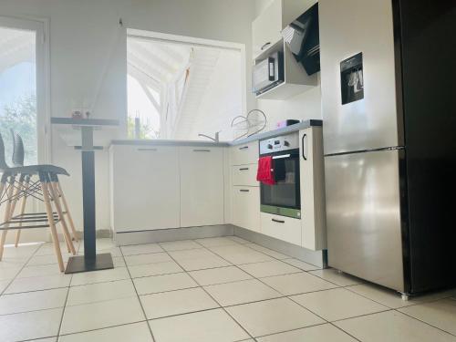 Удобства, Appartement Cosy - Entre nature et plages de rêve (Appartement Cosy - Entre nature et plages de reve) in Mare Gaillard Удобства, Appartement Cosy - Entre nature et plages de rêve (Appartement Cosy - Entre nature et plages de reve) in Mare Gaillard