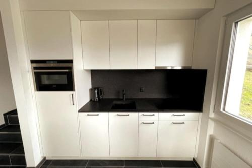 Konyha, Wohnung mit fantastischer Aussicht in Trin-Digg Konyha, Wohnung mit fantastischer Aussicht in Trin-Digg