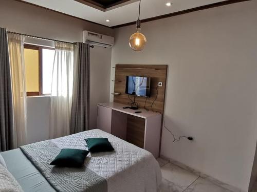 Chambre de luxe chez FOUR IN ONE Résidence (Chambre de luxe chez FOUR IN ONE Residence) in Лімбе Chambre de luxe chez FOUR IN ONE Résidence (Chambre de luxe chez FOUR IN ONE Residence) in Лімбе