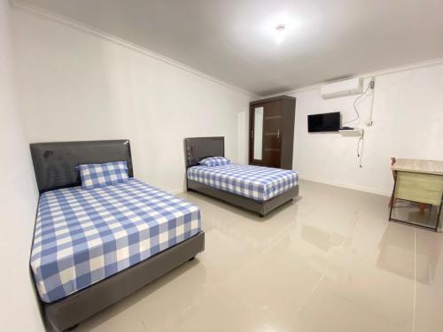 Guestroom, ALINIA PARK AND RESORT in Kuantan Singingi Regency Guestroom, ALINIA PARK AND RESORT in Kuantan Singingi Regency