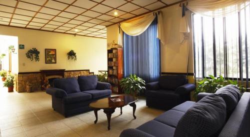 sala de TV, Adventure Inn in Heredia sala de TV, Adventure Inn in Heredia