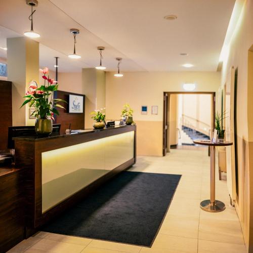 Лоби, Star Inn Hotel Premium Dresden im Haus Altmarkt, by Quality in Дрезден Лоби, Star Inn Hotel Premium Dresden im Haus Altmarkt, by Quality in Дрезден