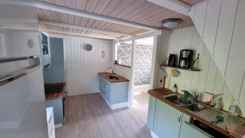 The Cozy red house with Amazing sea view in Hósvík The Cozy red house with Amazing sea view in Hósvík