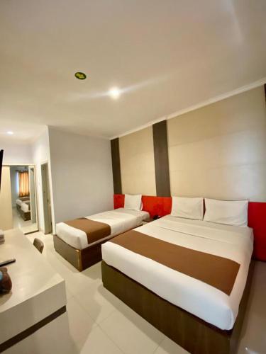 Dinasty Style Hotel near สวนบาเลกัมบัง Dinasty Style Hotel near สวนบาเลกัมบัง