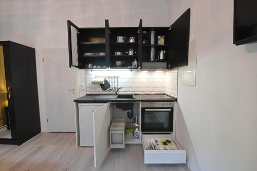 Kitchen, Style Apartment Berlin in Airport Berlin-Tegel Kitchen, Style Apartment Berlin in Airport Berlin-Tegel