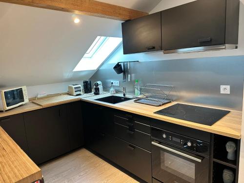 Konyha, appart du Vernay in Cran-Gevrier Konyha, appart du Vernay in Cran-Gevrier