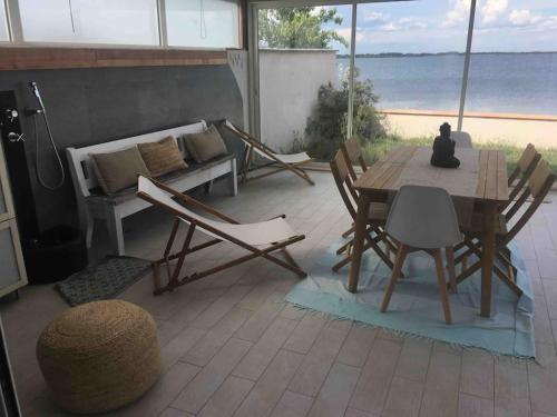 Erkély/terasz, Villa avec SPA & vue panomarique sur l'Etang in Perols Erkély/terasz, Villa avec SPA & vue panomarique sur l'Etang in Perols
