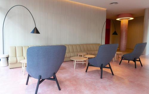 Shared lounge/TV area, Go Hotel Chonburi at Central Chonburi in Chonburi Shared lounge/TV area, Go Hotel Chonburi at Central Chonburi in Chonburi