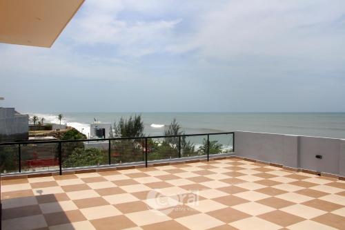 Balcony/terrace, Sea Breeze at ECR - Beach Front Villa with Private Pool, Jacuzzi and Dive-in Theater in Mamallapuram Balcony/terrace, Sea Breeze at ECR - Beach Front Villa with Private Pool, Jacuzzi and Dive-in Theater in Mamallapuram
