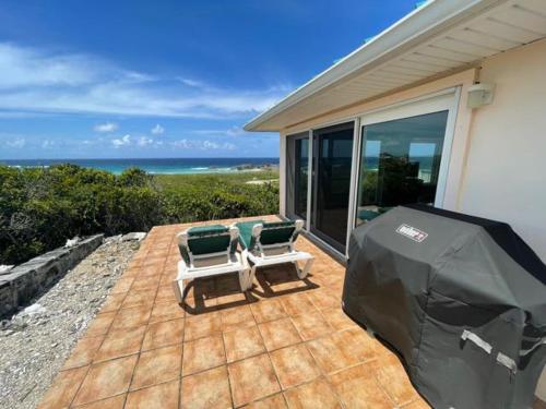 Terraza/balcón, Dragon Cay Resort Mudjin Harbour in Caicos del Norte Terraza/balcón, Dragon Cay Resort Mudjin Harbour in Caicos del Norte