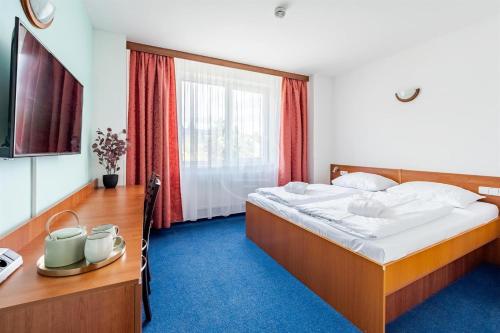 客房, Apartmán C409 v areálu Wellness hotelu Frymburk (Apartman C409 v arealu Wellness hotelu Frymburk) in 弗林布爾克 客房, Apartmán C409 v areálu Wellness hotelu Frymburk (Apartman C409 v arealu Wellness hotelu Frymburk) in 弗林布爾克