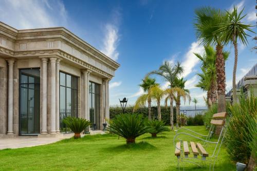 Kert, Movenpick Hotel du Lac Tunis in Tunisz Kert, Movenpick Hotel du Lac Tunis in Tunisz