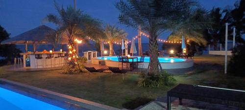 Garden, Beachfront Pool Villa and Apartment(Room3) in Dan Mai Garden, Beachfront Pool Villa and Apartment(Room3) in Dan Mai