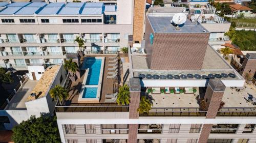 Exterior view, Porto Madero 202 – Apartamento Moderno em Condominio com Piscina e Academia no Rooftop no Centro de in Bombinhas Exterior view, Porto Madero 202 – Apartamento Moderno em Condominio com Piscina e Academia no Rooftop no Centro de in Bombinhas