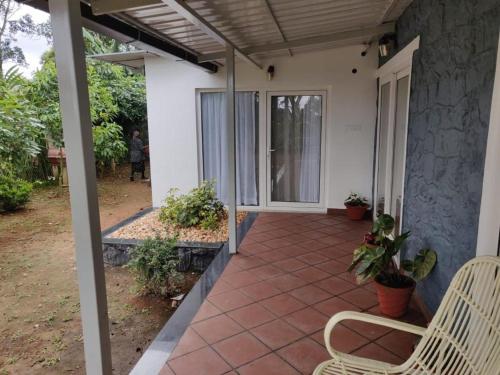 Altan/terrasse, Thondiyar Estate Bungalow by LexStays in Periyar Altan/terrasse, Thondiyar Estate Bungalow by LexStays in Periyar