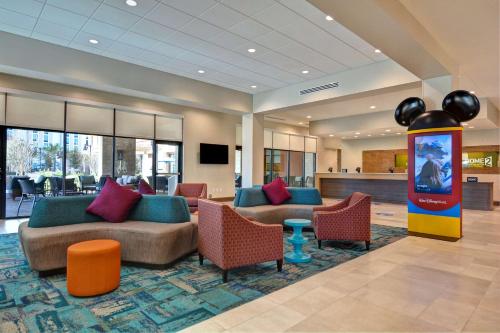 Lobby, Home2 Suites by Hilton Orlando Flamingo Crossings in Disney West Area Lobby, Home2 Suites by Hilton Orlando Flamingo Crossings in Disney West Area