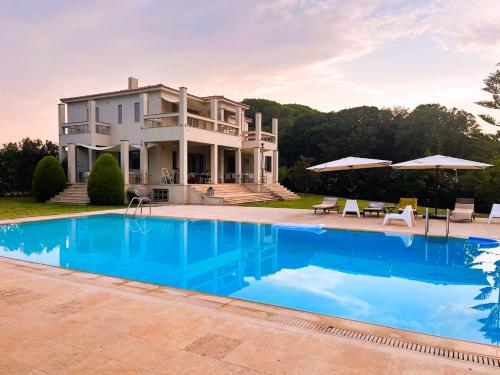 ทัศนียภาพภายนอกโรงแรม, Villa Astoria in เอ็มพูกา (อิเลีย) ทัศนียภาพภายนอกโรงแรม, Villa Astoria in เอ็มพูกา (อิเลีย)