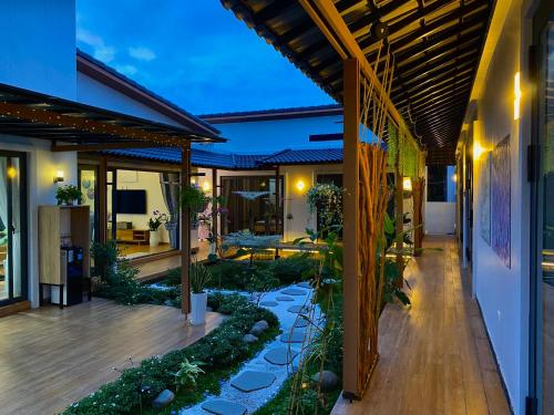 Jardí, Casa de 20 m2 amb 5 habitació i 5 bany privat a Dương Tơ (LENA Homestay Phú Quốc) near Aeroport Internacional de Phu Quoc Jardí, Casa de 20 m2 amb 5 habitació i 5 bany privat a Dương Tơ (LENA Homestay Phú Quốc) near Aeroport Internacional de Phu Quoc