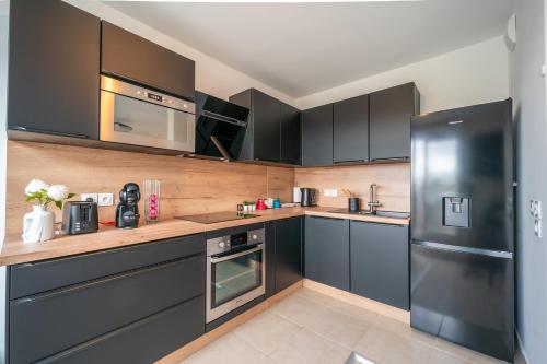 廚房, Carré d'As - Appartement de standing (Carre d'As - Appartement de standing) in 勒布爾熱 廚房, Carré d'As - Appartement de standing (Carre d'As - Appartement de standing) in 勒布爾熱