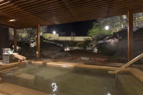 Open air bath, Fuji Lake Hotel in Fujikawaguchiko Open air bath, Fuji Lake Hotel in Fujikawaguchiko