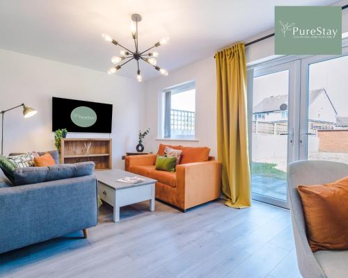 delat sällskapsrum/tv-rum, Designer House in Manchester Near Stadium with Wi-Fi & Parking by PureStay Short Lets & Serviced Acc in Manchester delat sällskapsrum/tv-rum, Designer House in Manchester Near Stadium with Wi-Fi & Parking by PureStay Short Lets & Serviced Acc in Manchester