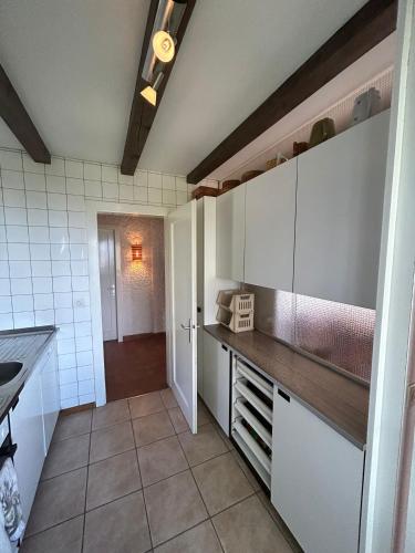 Kitchen, Tschoueilles 005 MOUNTAIN & QUIET chalet 10 pers in Clebes Kitchen, Tschoueilles 005 MOUNTAIN & QUIET chalet 10 pers in Clebes