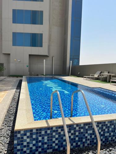 Swimming pool, Hotel Suites - DAMAC Tower Riyadh near Kingdom Center Tower Swimming pool, Hotel Suites - DAMAC Tower Riyadh near Kingdom Center Tower