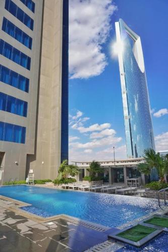 Swimming pool, Hotel Suites - DAMAC Tower Riyadh near Kingdom Center Tower Swimming pool, Hotel Suites - DAMAC Tower Riyadh near Kingdom Center Tower