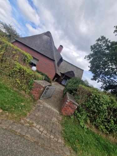 A szálláshely kívülről, Fewo "Lütt Stuv" (Fewo "Lutt Stuv") in Fockbek A szálláshely kívülről, Fewo "Lütt Stuv" (Fewo "Lutt Stuv") in Fockbek