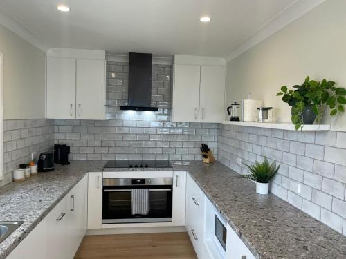 кухня, Wanda House - Close to beach Linen Pets in Порт Стивънс кухня, Wanda House - Close to beach Linen Pets in Порт Стивънс