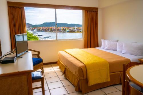 Aqua Vi Marina Hotel & Suites in Puerto La Cruz Aqua Vi Marina Hotel & Suites in Puerto La Cruz