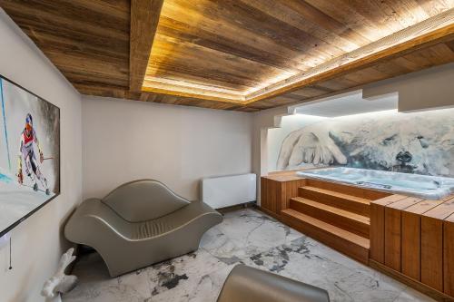 Pezsgőfürdő, Le Cheval Blanc Luxe, skis aux pieds, jacuzzi, hammam, salle de cinéma (Le Cheval Blanc Luxe, skis aux pieds, jacuzzi, hammam, salle de cinema) in Le Raffort Pezsgőfürdő, Le Cheval Blanc Luxe, skis aux pieds, jacuzzi, hammam, salle de cinéma (Le Cheval Blanc Luxe, skis aux pieds, jacuzzi, hammam, salle de cinema) in Le Raffort