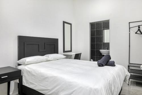 Salle de bain, Inn & Out Express Sea Point in Le Cap Salle de bain, Inn & Out Express Sea Point in Le Cap